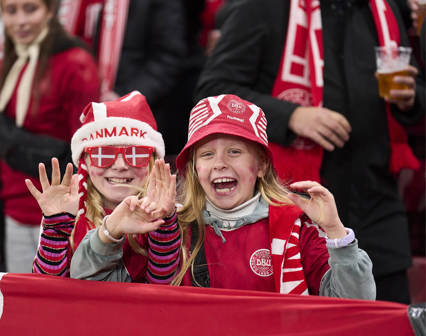 COPENHAGEN, DENMARK - NOVEMBER 15: Fans of Denmark cheer prior to the UEFA Nations League match between Denmark and Spain at Parken on November 15, 2024 in Copenhagen, Denmark. (Photo by Lars R nb g / FrontzoneSport)