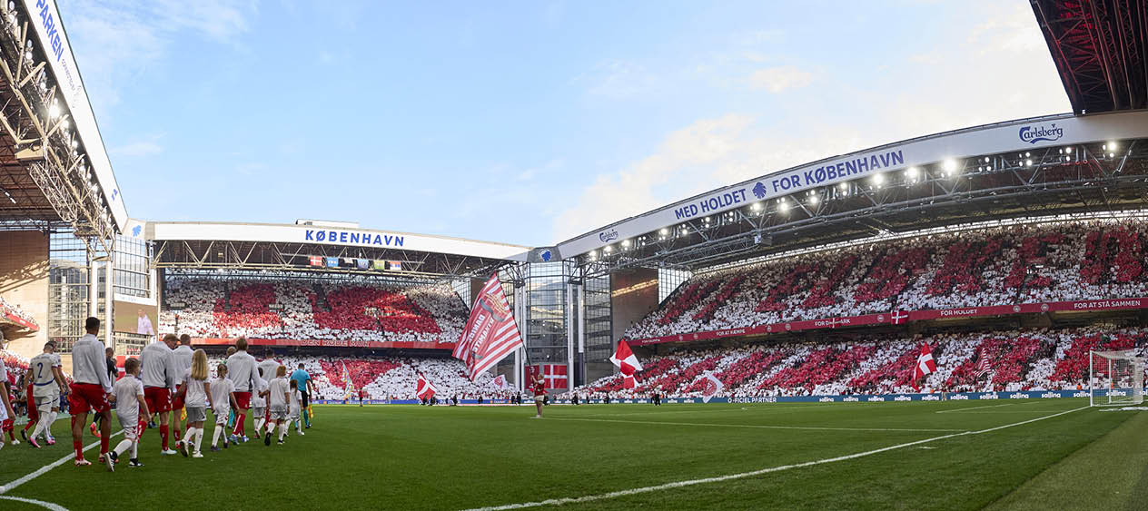 COPENHAGEN, DENMARK - SEPTEMBER 08: (EDITORS NOTE: Image was created using multiple exposures) Generel view of the players of Denmark walking on to the pitch with mascots prior to the UEFA Nations League match between Denmark and Serbia at Parken on September 8, 2024 in Copenhagen, Denmark. (Photo by Lars R nb g / FrontzoneSport)