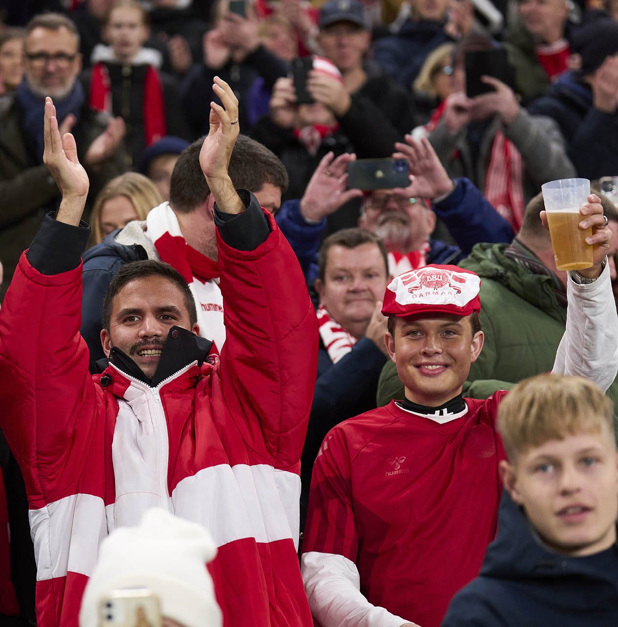 COPENHAGEN, DENMARK - NOVEMBER 15: Fans of Denmark cheer prior to the UEFA Nations League match between Denmark and Spain at Parken on November 15, 2024 in Copenhagen, Denmark. (Photo by Lars R nb g / FrontzoneSport)